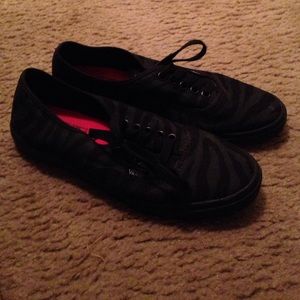 Black on black zebra print vans