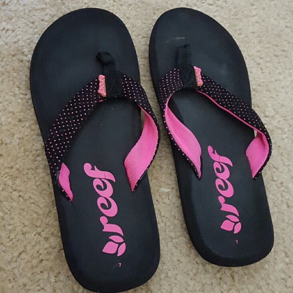 Pink and black reef flip flops