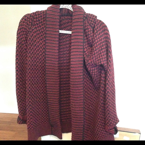 A red and black cardigan