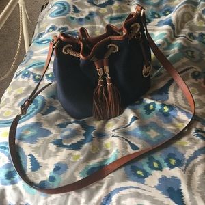 Michael Kors Navy Blue canvas w/luggage trim.