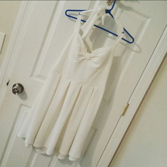 All white Marlin Monroe dress.