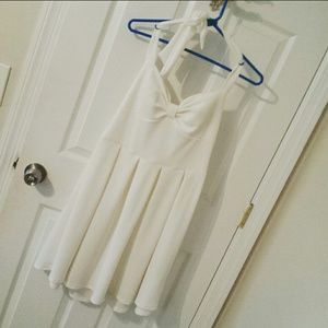 All white Marlin Monroe dress.