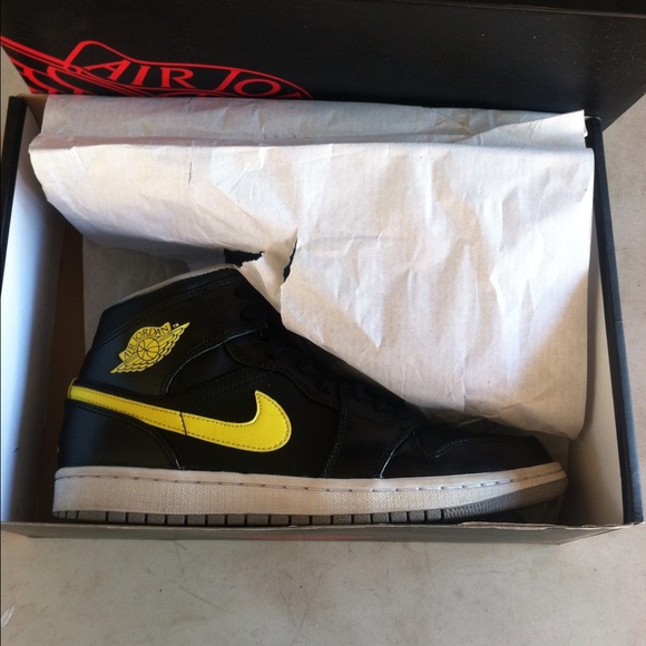 Black x Yellow Air Jordan 1s.