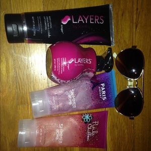 Body shimmer, lotion, and sunglasses