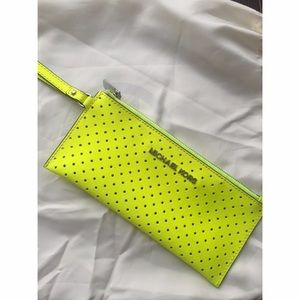 Michael Kors Neon Yellow perforated wristlet