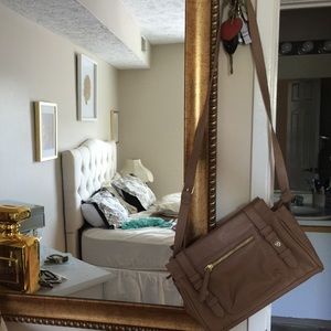 Tan cross body bag
