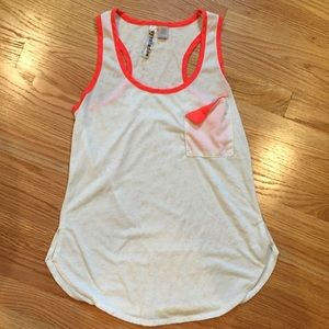 White tank top with orange/pink details