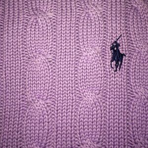 A purple sweater