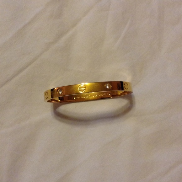 18kt GOLD LOVE SCREW BRACELET says Cartier