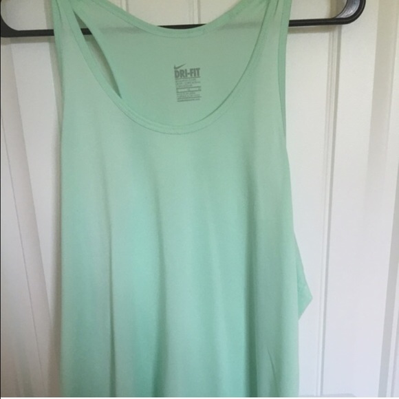 RESERVED Bundle of Nike tanks
