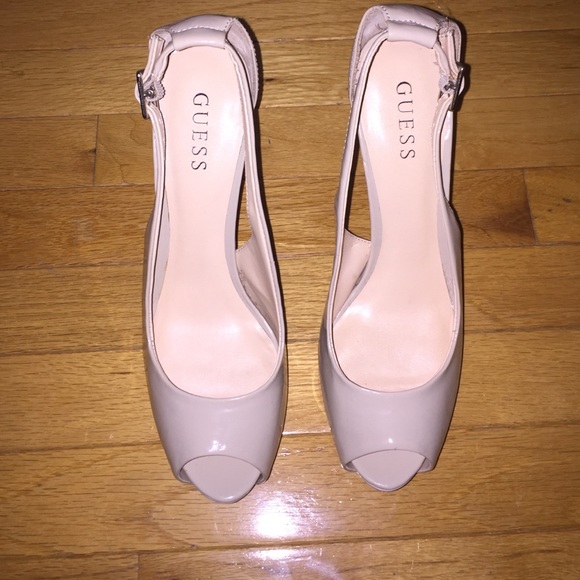 Tan colored peep toe pumps