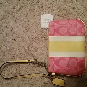 Small Pink Coach wristlet