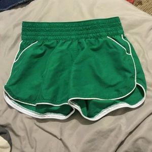 Green tennis shorts