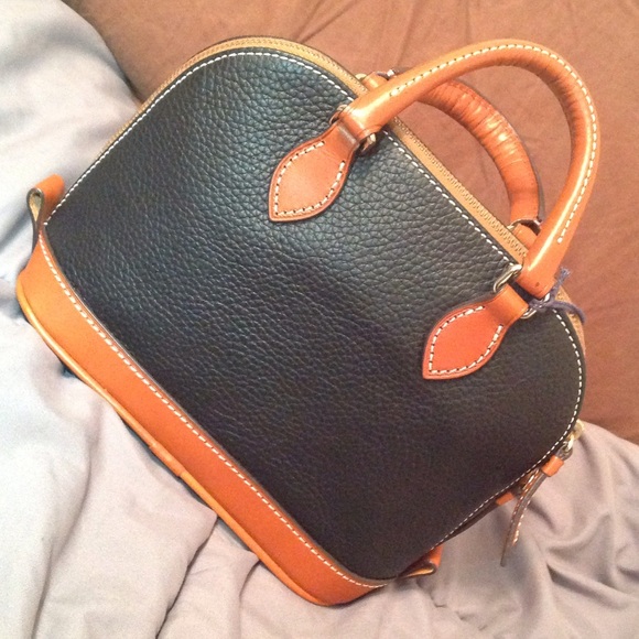 The Pebble Grain Zip Zip Satchel is one of our most iconic  Dooney & Bourke Pebble Zip Zip Satchel