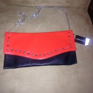 Black and orange clutch with studs