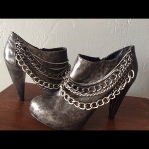 Buckle brand pewter boot heels with chain accent