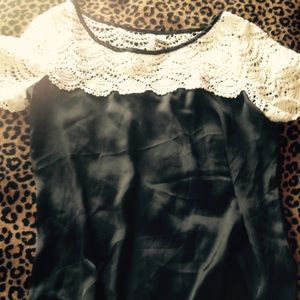 Black and lace cream top