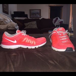 Pinky orangish Nike shoes!
