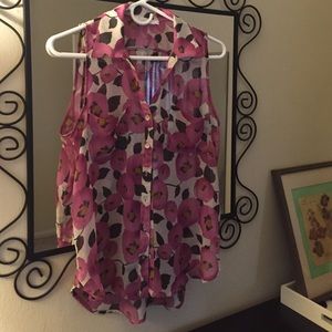 Two collard sleeveless tops