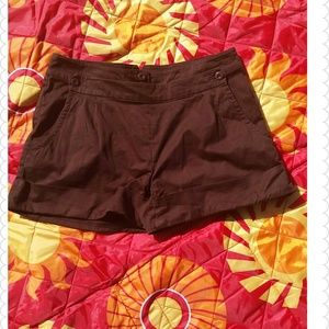 Chocolate brown shorts.