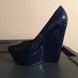 Navy Blue Patent Wedge Pumps.
