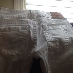 Low rise true religion jeans small brown stain