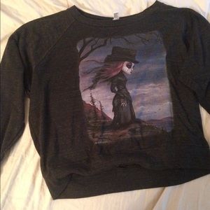 Black long sleeve sweater with crying girl