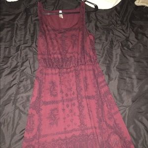 Maroon dress with black design