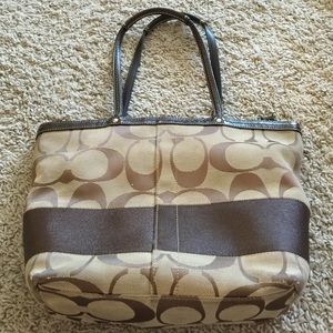 Authentic brown Coach bag. A little worn.