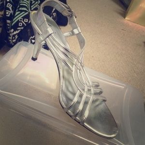 Small silver heel worn once; Like new