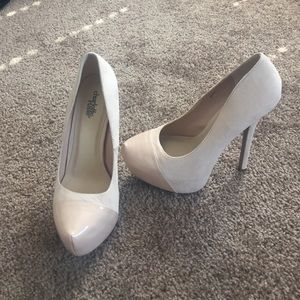 Nude hidden platform closed toed high heels