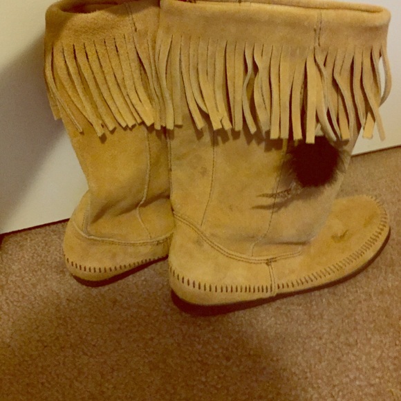 Moccasin style fringe boots
