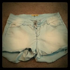 High waisted light colored shorts