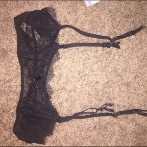 Black lace garter belt. NWT