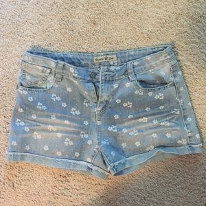 Flowery blue jean shorts