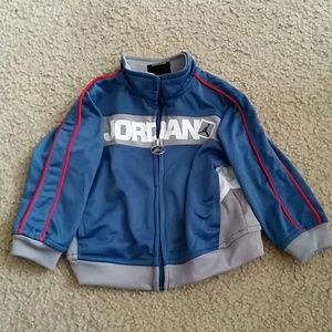 Blue, gray, and white Jordan windbreaker