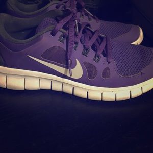 Purple Nike shoes