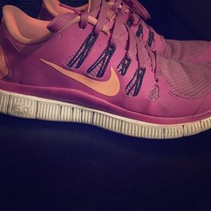 Pink Nike free runs 5.0