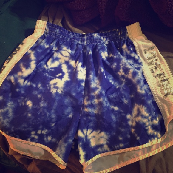 Victoria Secret PINK running shorts.