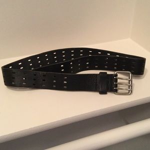 black belt with holes all around