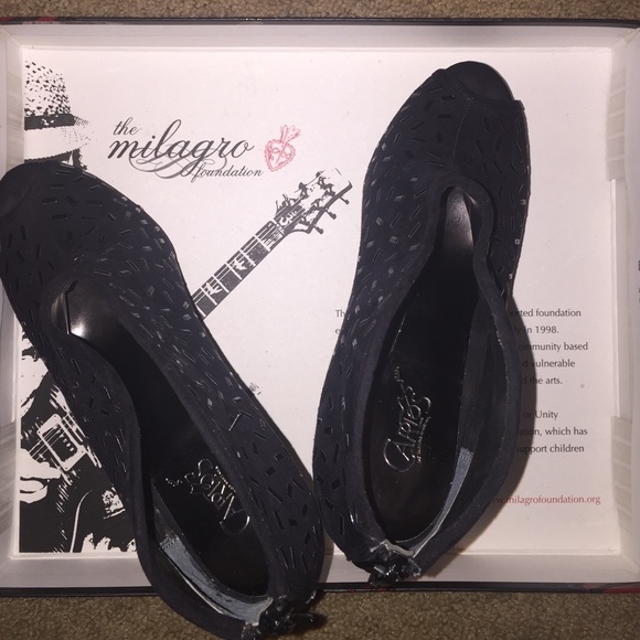 Carlos Santana heels
