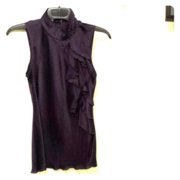 Rich purple top with ruffle accent