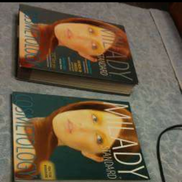 Milady Cosmetology textbook, 2 workbooks college