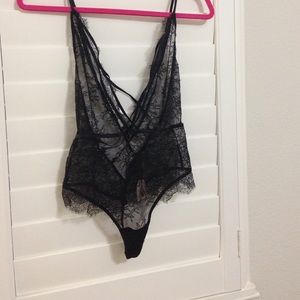 Brand new never worn black lace one piece lingerie