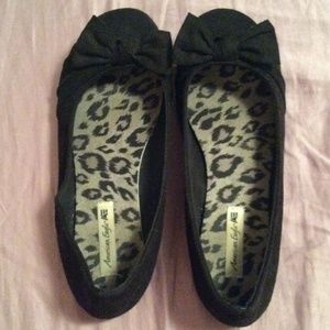 Black flats with bows