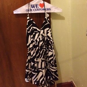 It's a black and white sleeveless romper!