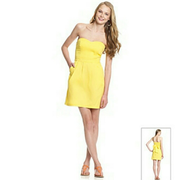Yellow pleated skirt dress