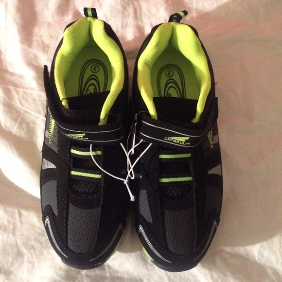 Glow in the dark green/ black running shoes.