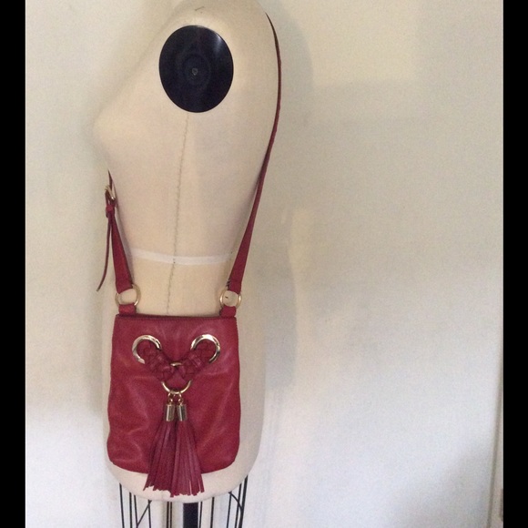 Red sling Michael Kors purse
