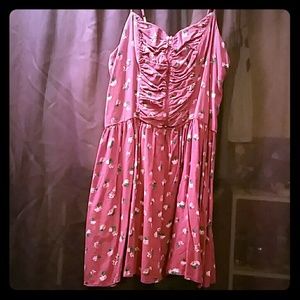 Purple patterned dress.